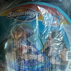 Brand new- never open swim stage 1 float device with canopy